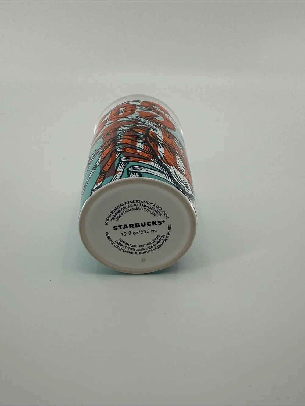 Starbucks Boston Travel Tumbler with Turquoise Lid and Orange Graphic
